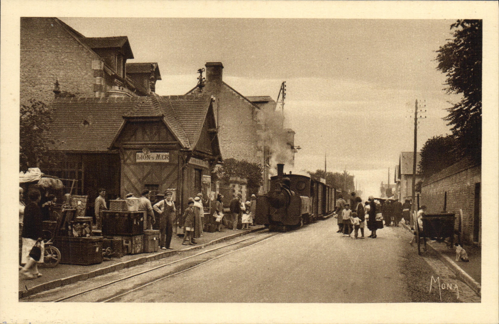 VINTAGE POSTCARD Lion sur Mer Train station and the train of Caen to the sea