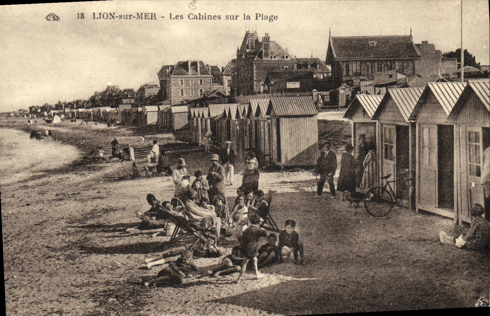VINTAGE POSTCARD Lion sur Mer cabins on the Beach
