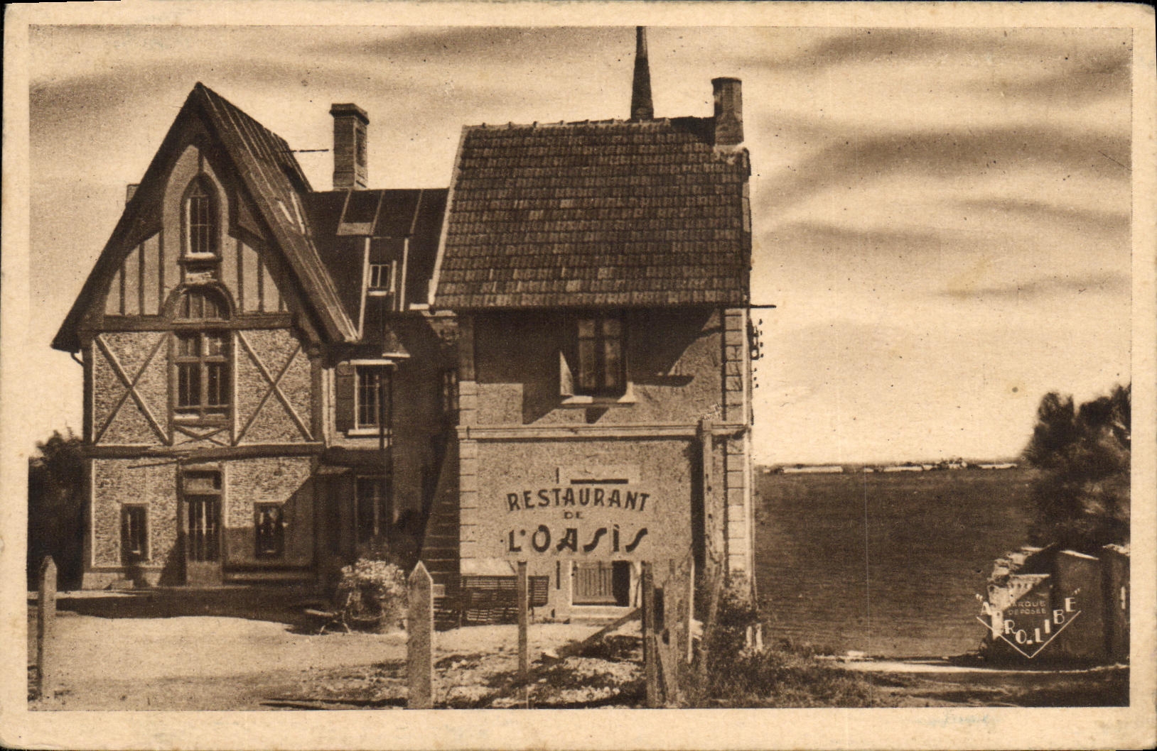 CPA Arromanches les Bains Le Port de la Liberation Restaurant Hotel de l Oasis a la Breche de Tracy