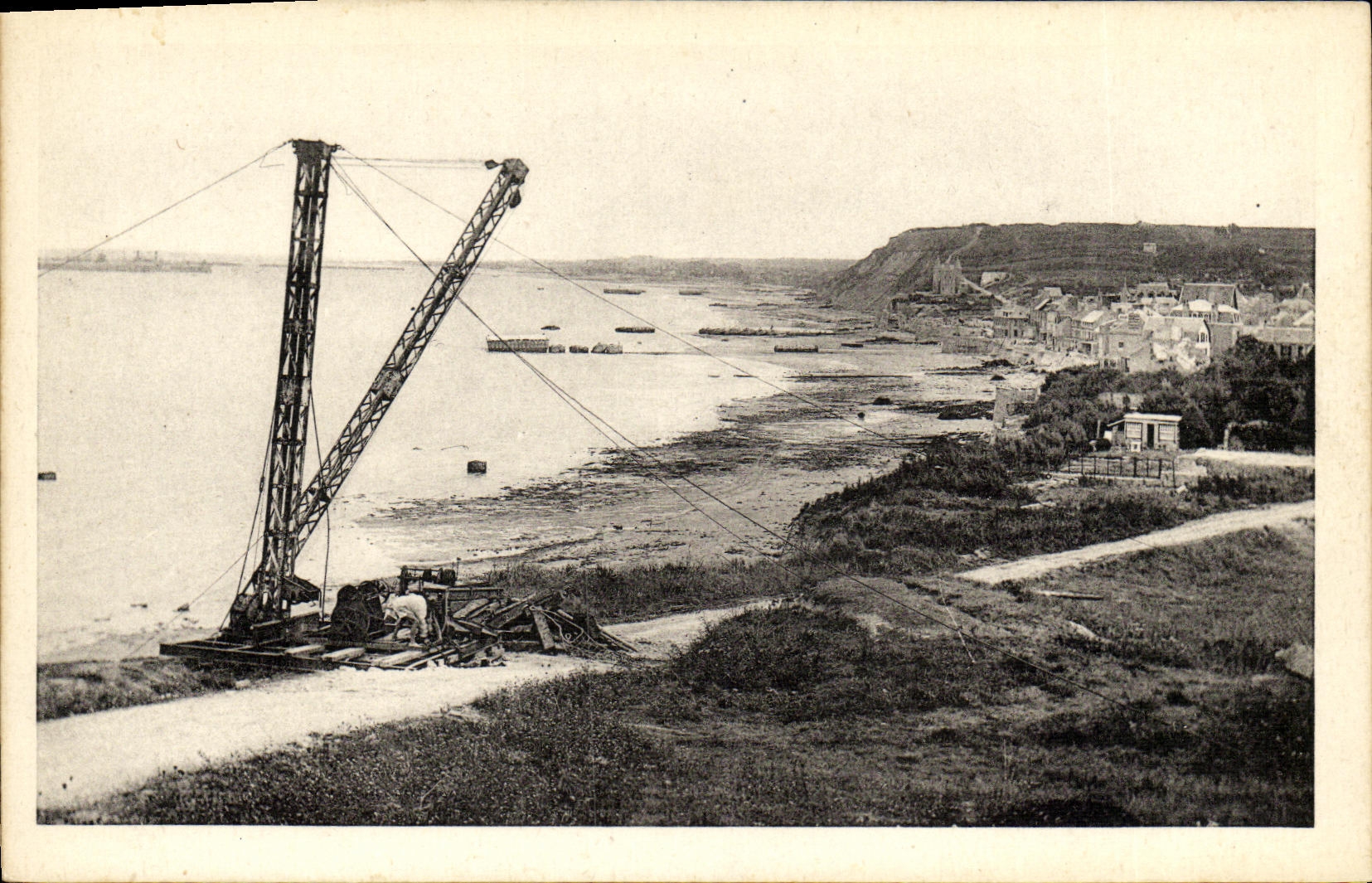 Opinion panoramica de Arromanches de la POSTAL de la VENDIMIA de la playa