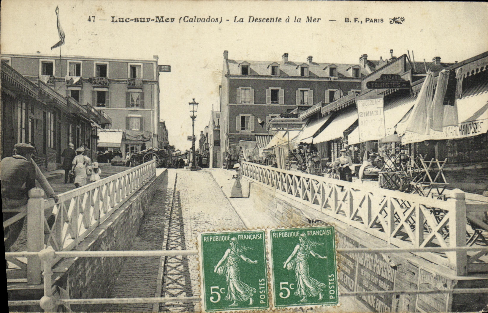 POSTAL Lucas de la VENDIMIA en pendiente del mar con el mar