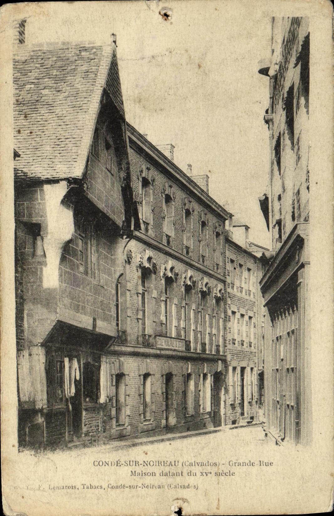 VINTAGE POSTCARD Cop On Main street Noireau house