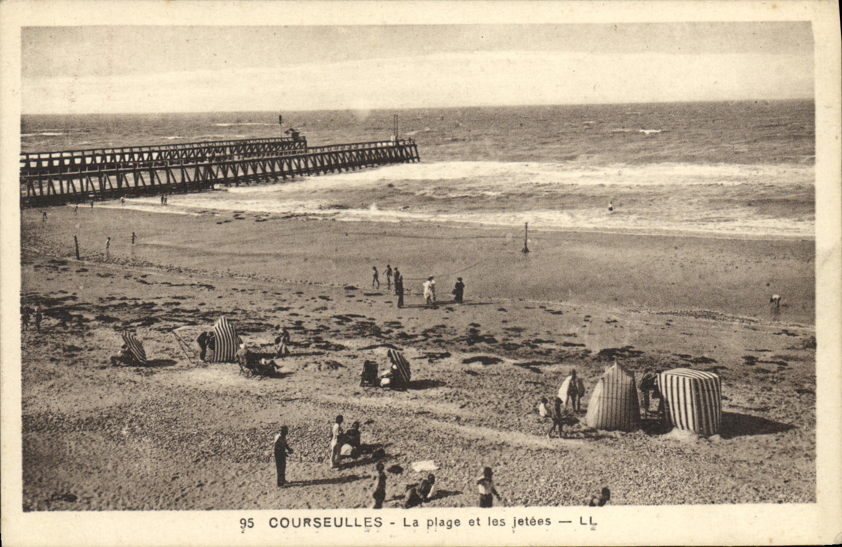 VINTAGE POSTCARD Courseulles the Beach and Piers