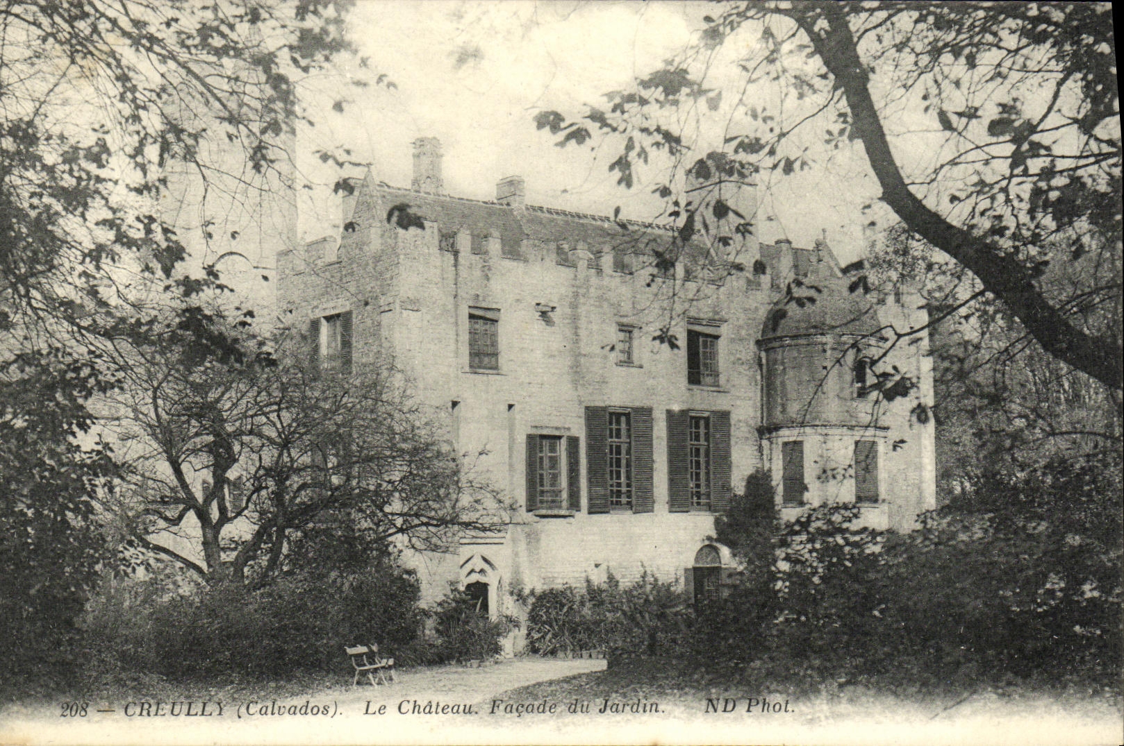 VINTAGE POSTCARD Creully the Castle Frontage of the Garden