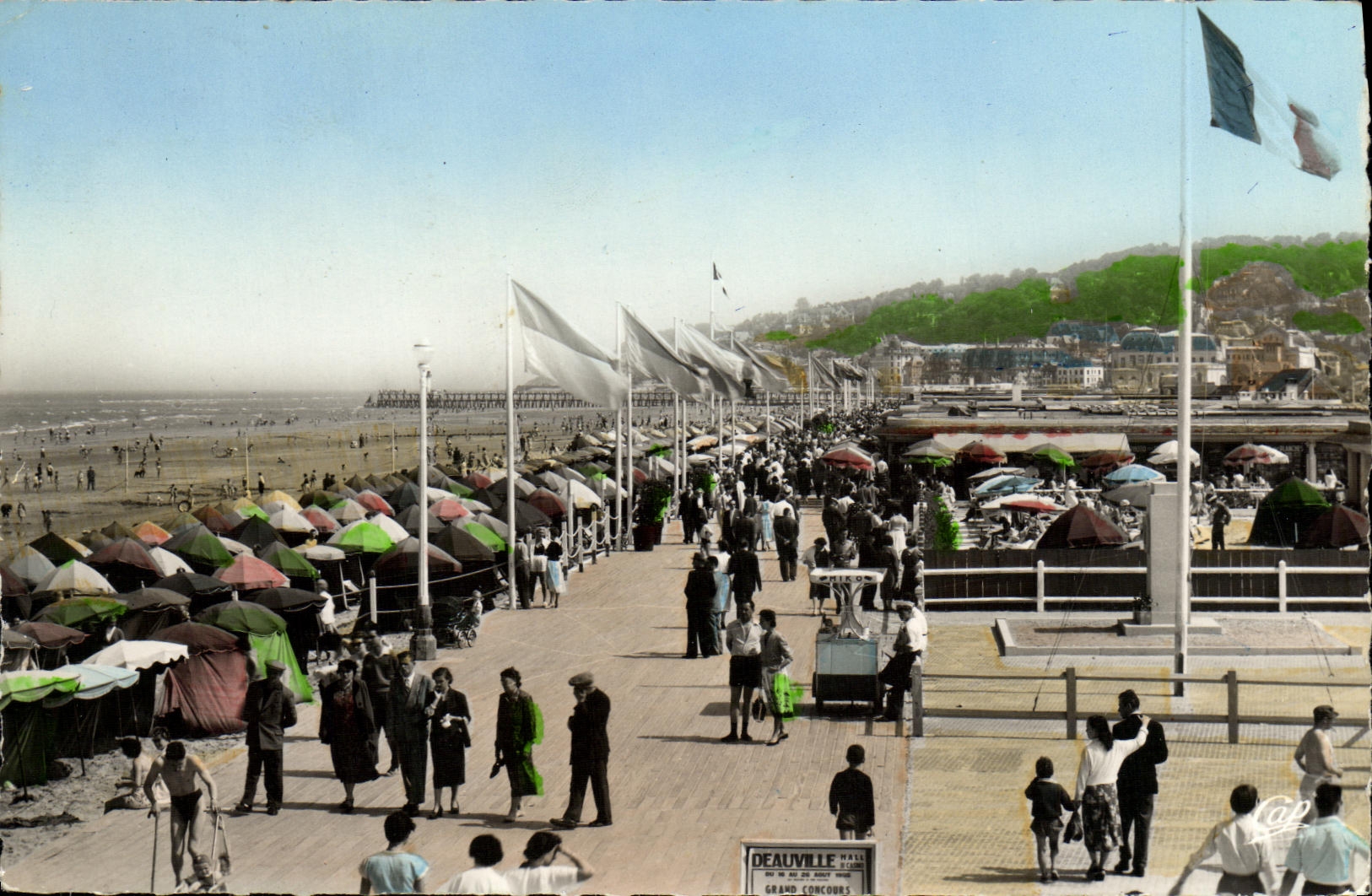 La POSTAL DeauvillePlage de la VENDIMIA florecio los tableros y la playa