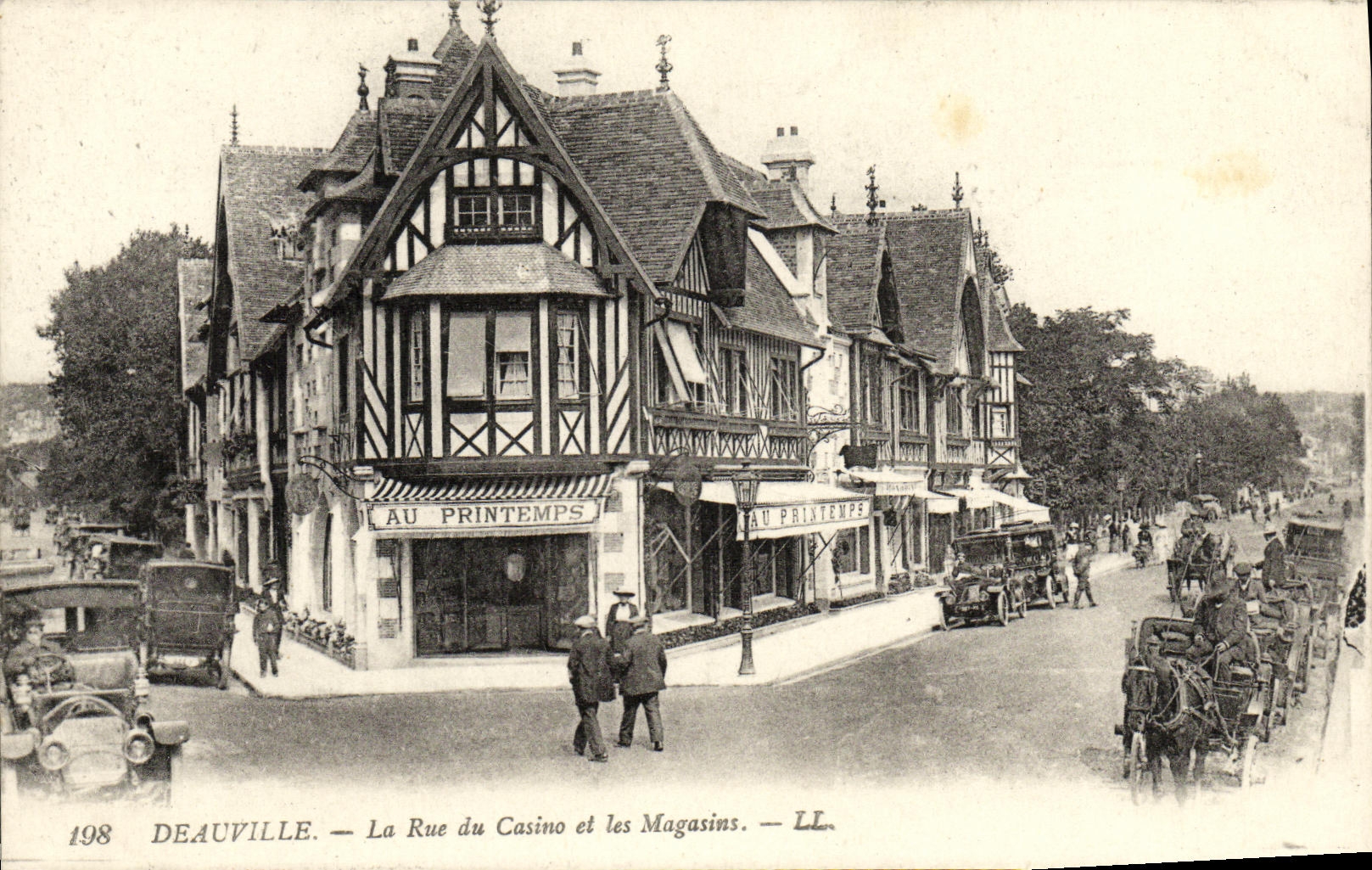VINTAGE POSTCARD Deauville the Street of the Casino and Stores In spring