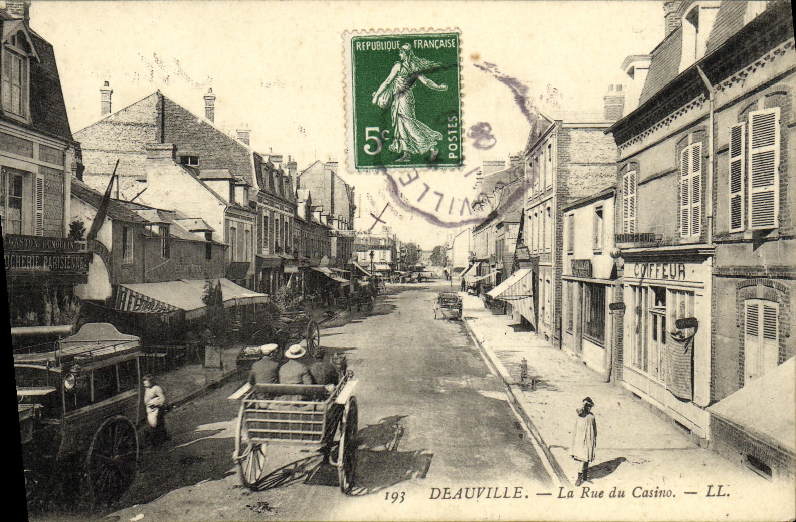 VINTAGE POSTCARD Deauville the Street of the Casino Parisian Butchery Hairdresser