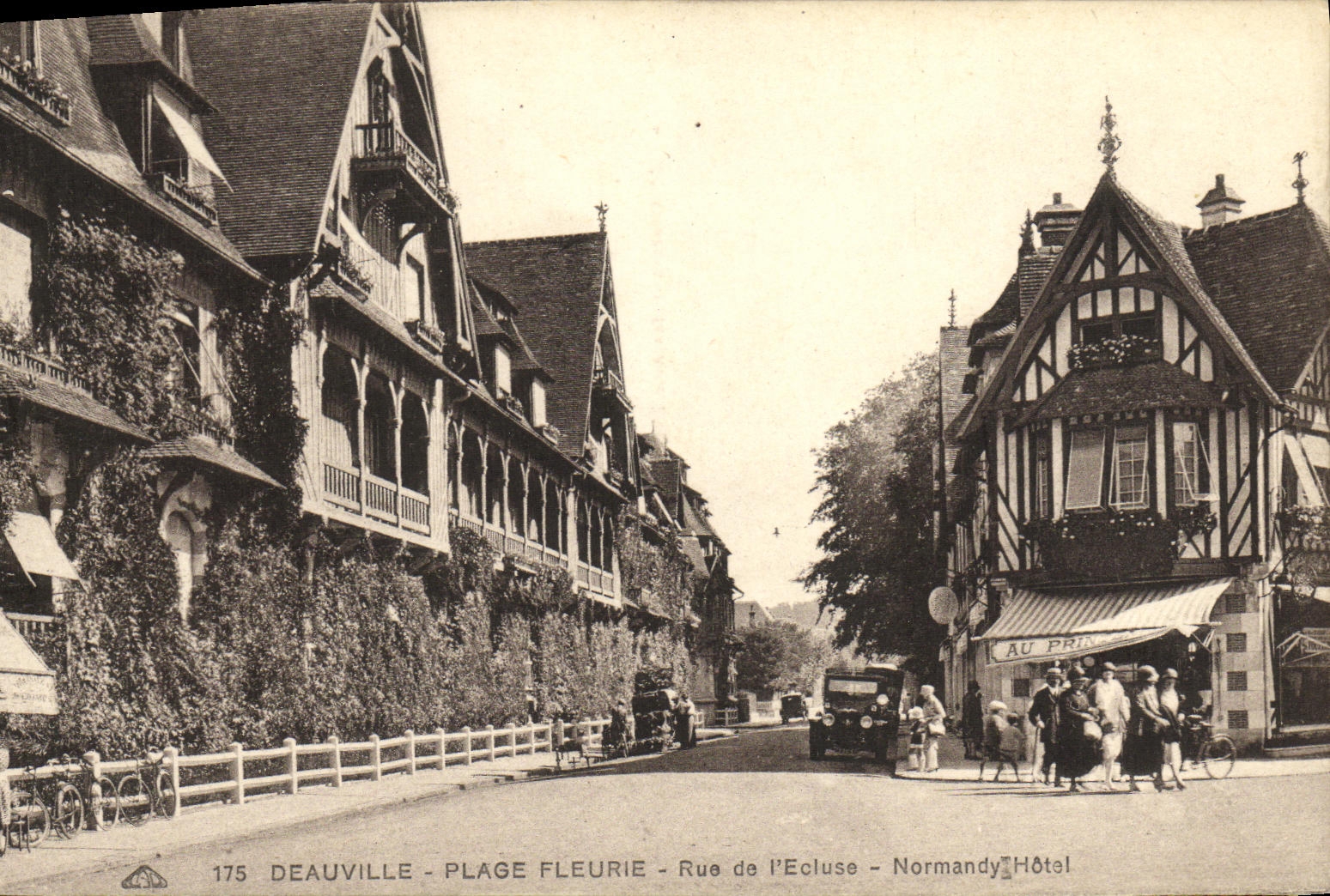 La POSTAL Deauville de la VENDIMIA florecio la calle de la playa de L almacen del hotel de Normandia de las cerraduras en resorte