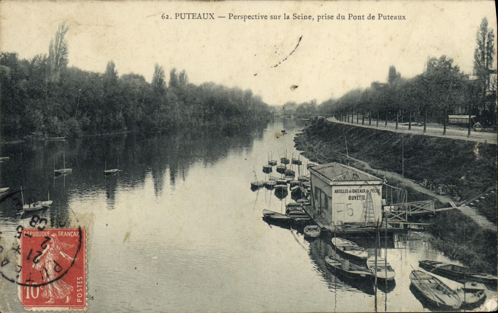 La perspectiva Puteaux de la POSTAL de la VENDIMIA en el Seine tomado del puente de los barcos de Puteaux Barges