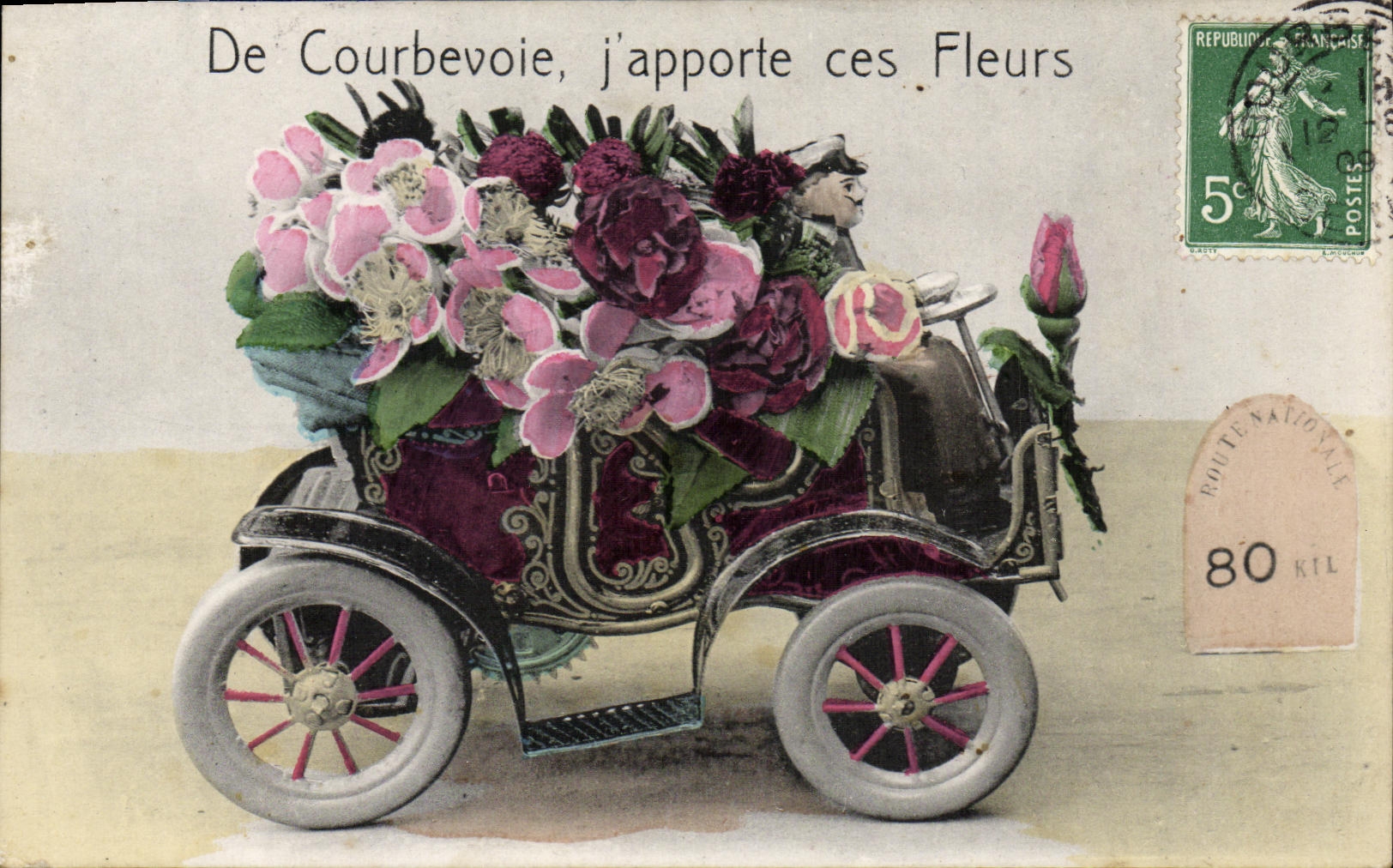 La POSTAL Courbevoie J de la VENDIMIA trae a estos el coche de las flores
