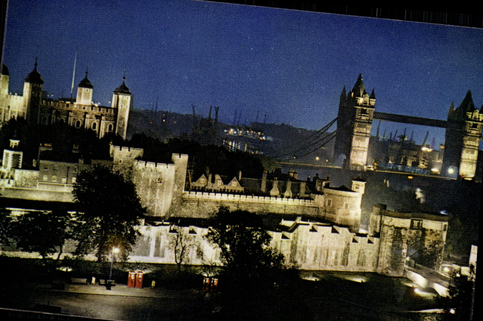 CPM London by night Tower of London and tower bridge 
