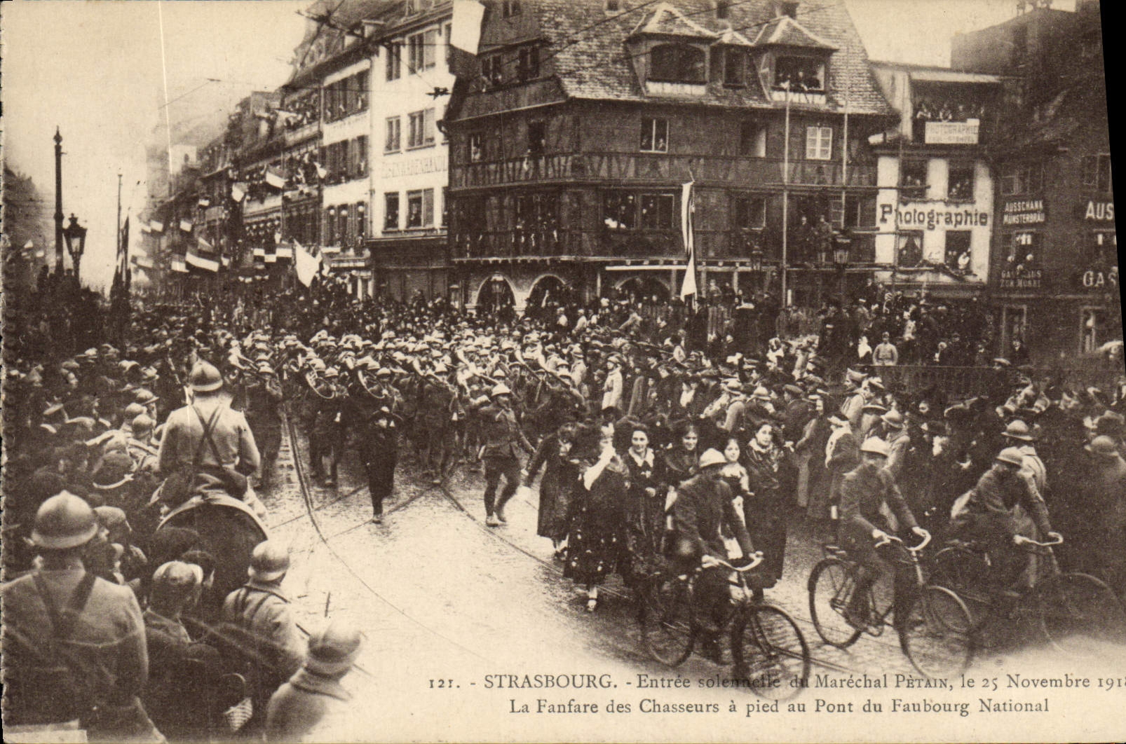VINTAGE POSTCARD Strasbourg Entree solemn of the Marshal Petain Fanfare of the hunters has foot to the bridge of the National Suburb Bicycle Cycles