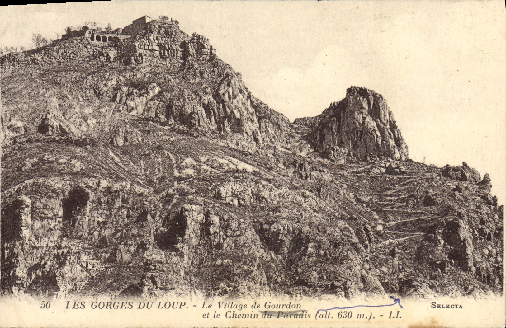 Catarata de la POSTAL de la VENDIMIA del lobo la aldea de Gourdon y el chemion del paraíso