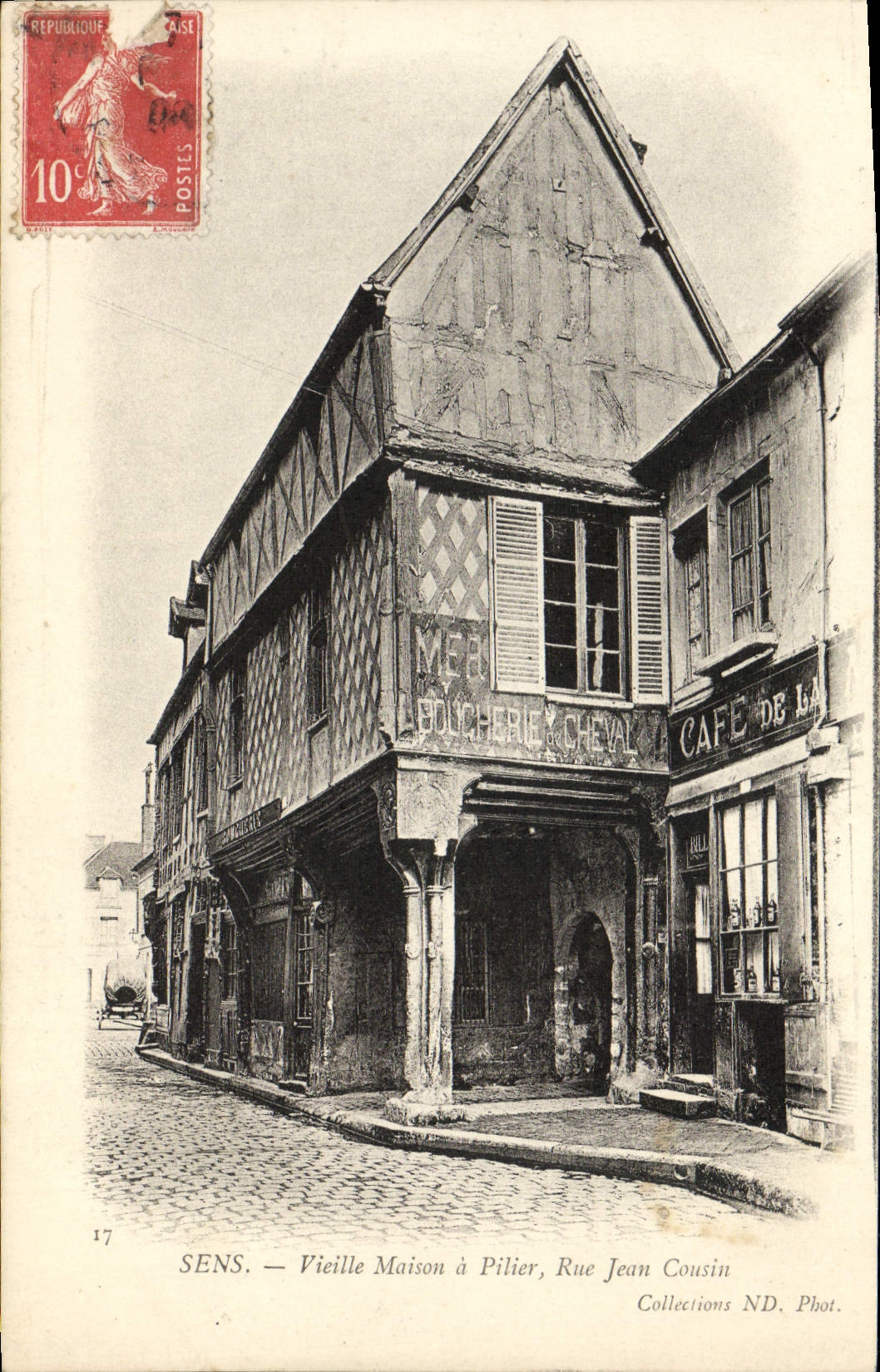 La casa de la mujer mayor de la POSTAL de la VENDIMIA Sens tiene carnicería del primo de Jean de la ruda del pilar