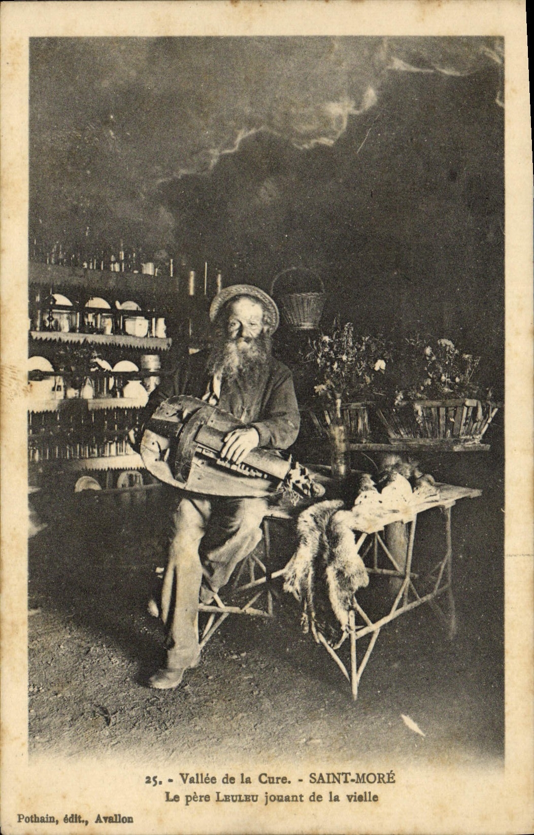 VINTAGE POSTCARD Valley of the Cure More Saint the Leuleu father playing of hurdy-gurdy TOP