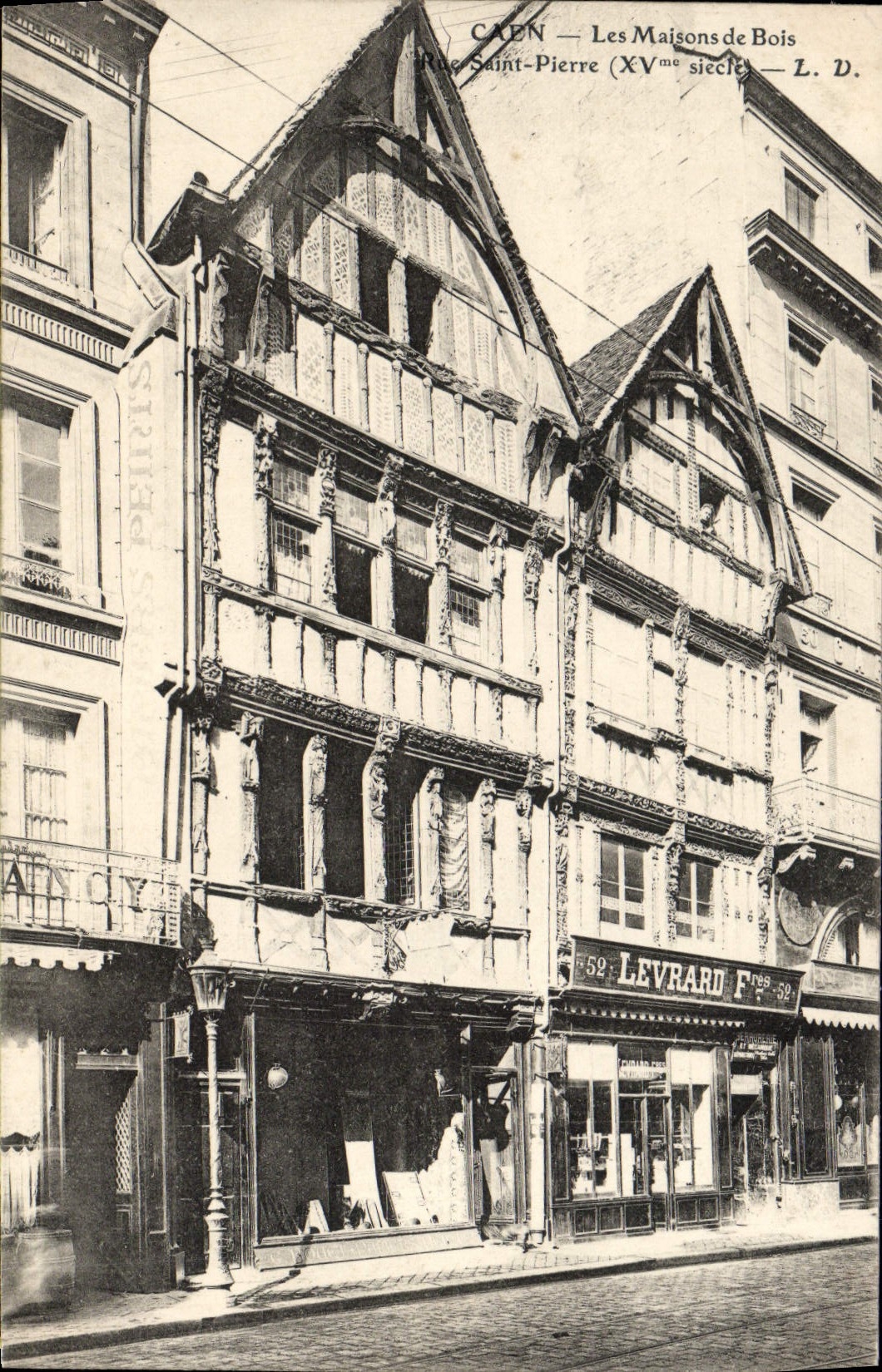 Casas de madera de Caen de la POSTAL de la VENDIMIA del Saint Pierre de Levrard