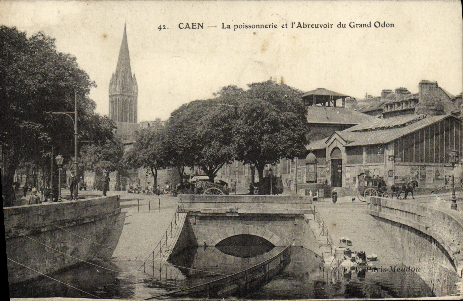 La POSTAL Caen de la VENDIMIA los pescados hace compras y el canal de alimentación de Odón grande