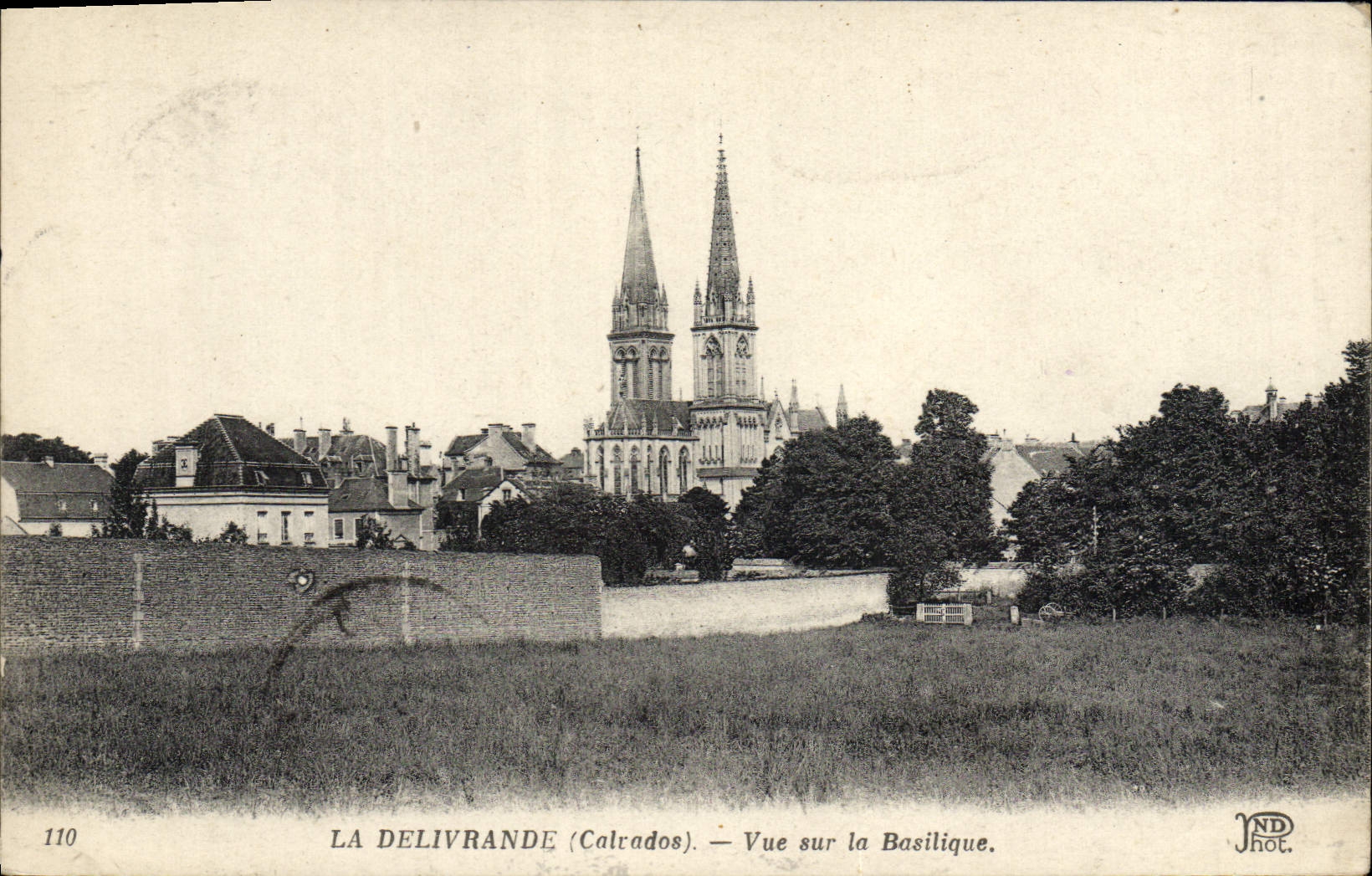 VINTAGE POSTCARD Delivrande Seen on the Basilica