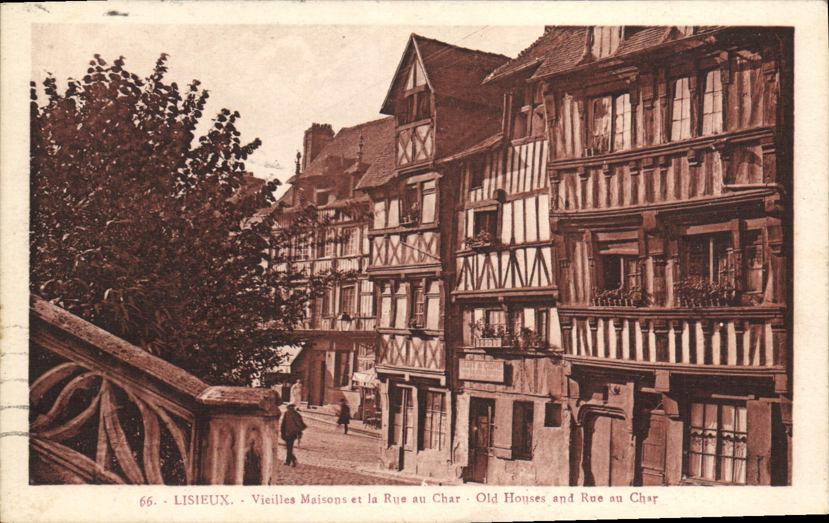 Casas de las mujeres mayores de Lisieux de la POSTAL de la VENDIMIA y la calle con el tanque
