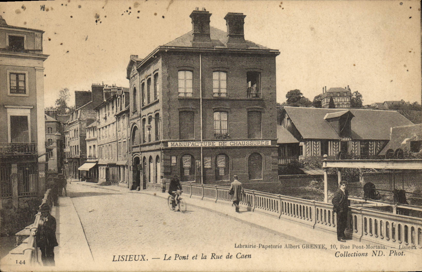 VINTAGE POSTCARD Lisieux Street the Bridge and the Street of Caen Manufactures shoes