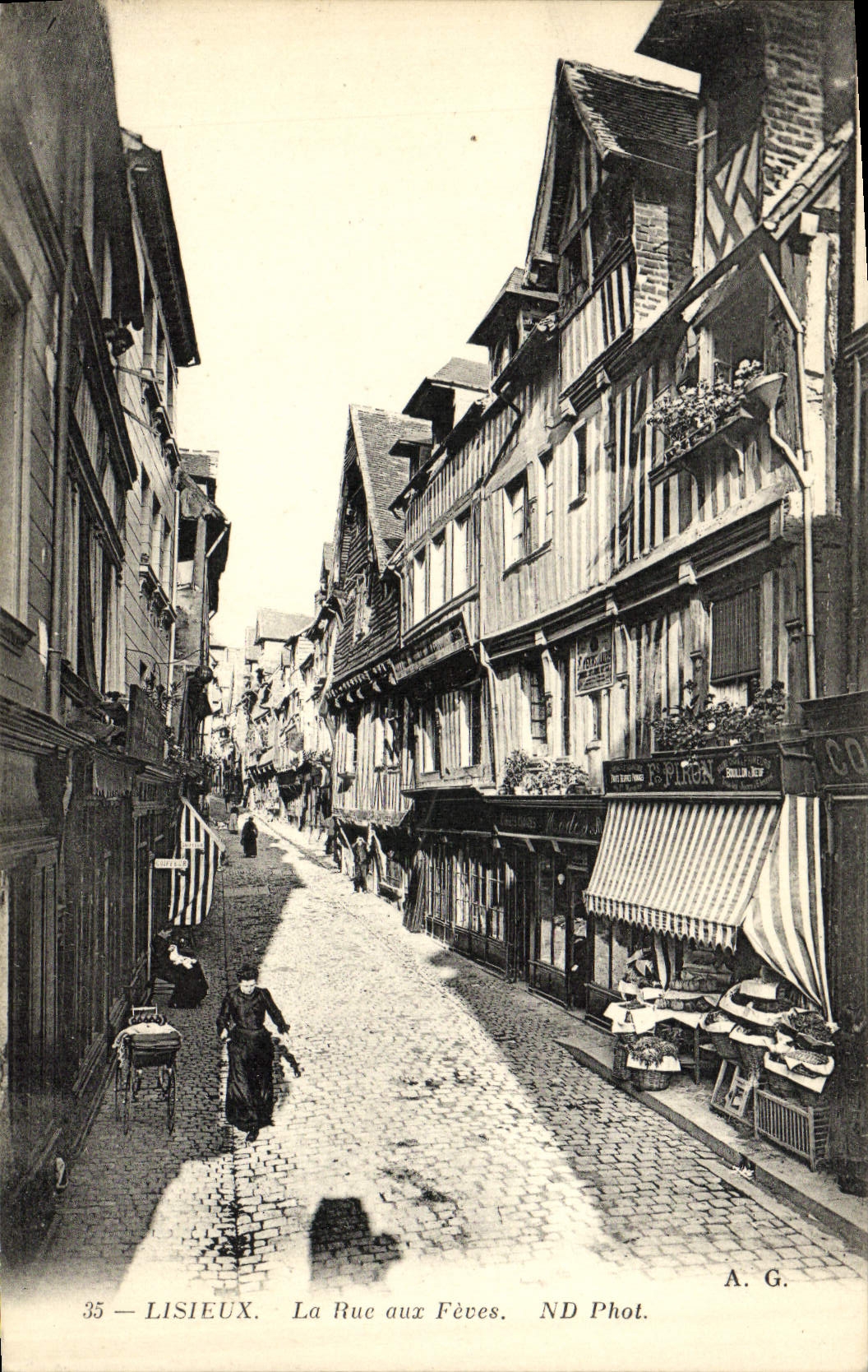 VINTAGE POSTCARD Lisieux the Street with Broad beans
