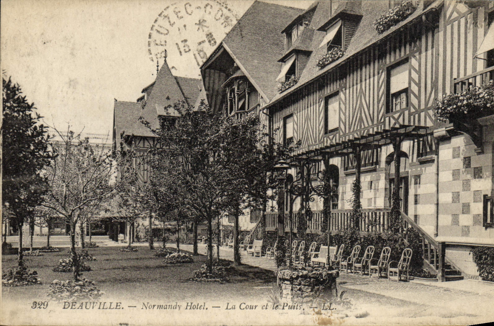 VINTAGE POSTCARD Deauville Normandy hotel court and the well