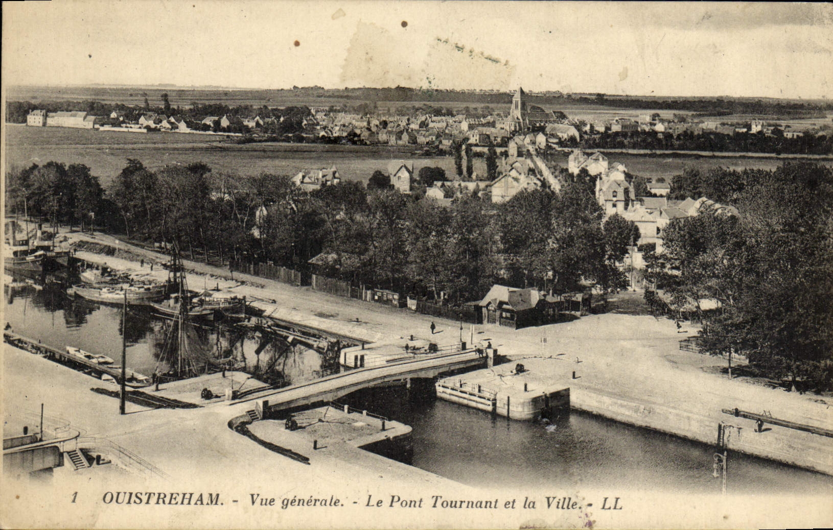 VINTAGE POSTCARD Ouistreham View the revolving bridge and the city