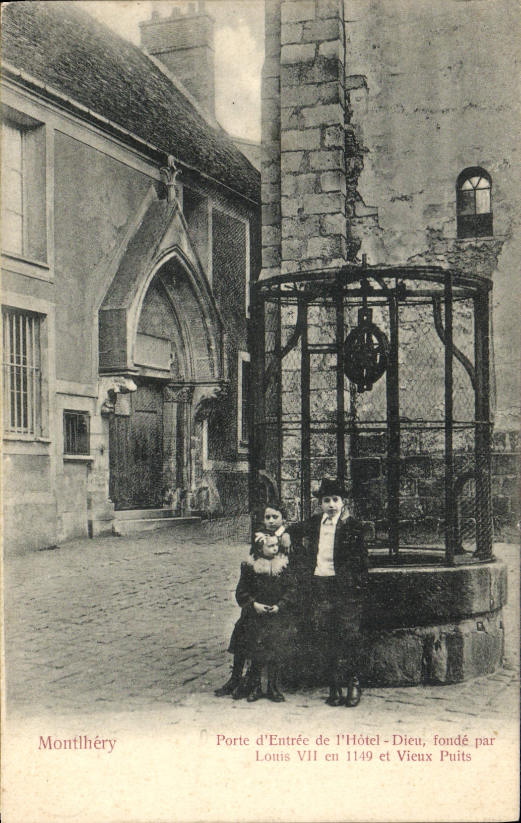 VINTAGE POSTCARD Montlhery Main door of the Hotel god founds by louis VII and old Enfants well