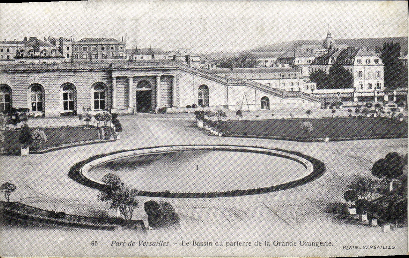 Parque de la POSTAL de la VENDIMIA de Versalles el lavabo del piso del naranjal grande