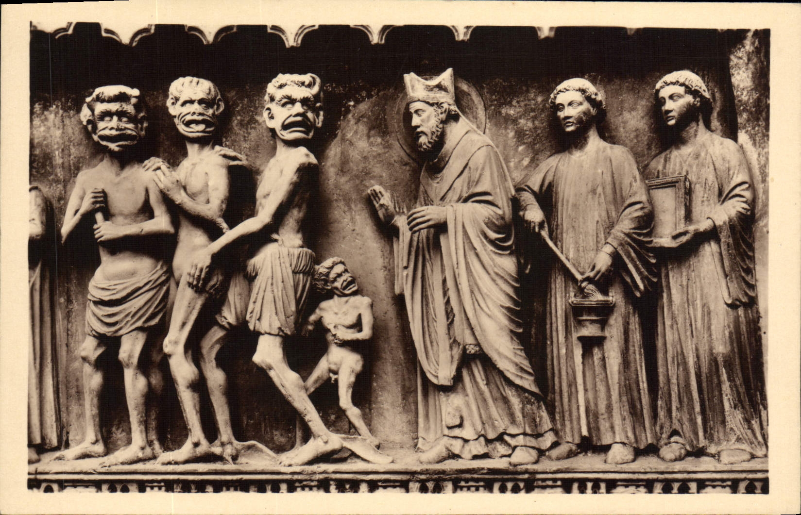 VINTAGE POSTCARD Rheims Cathedral of Gate St Sixth Saiont Remi driving out the demons of the Devil city