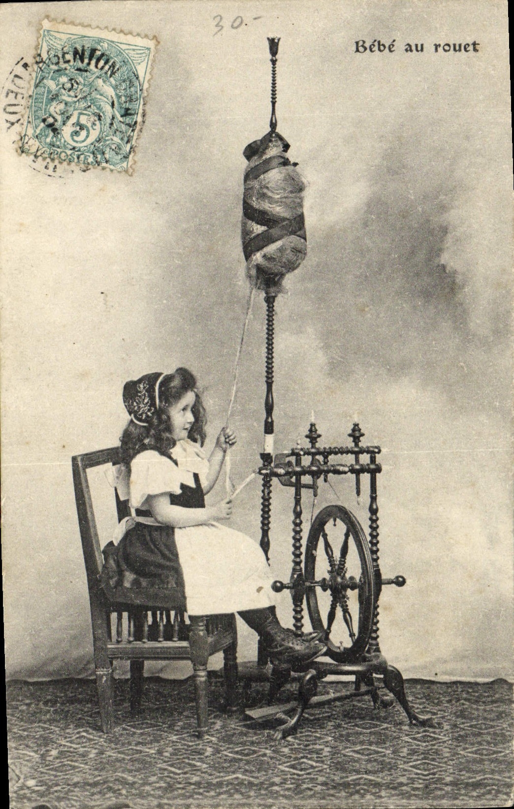 VINTAGE POSTCARD Baby with the Wheel Child Ropemaking machine
