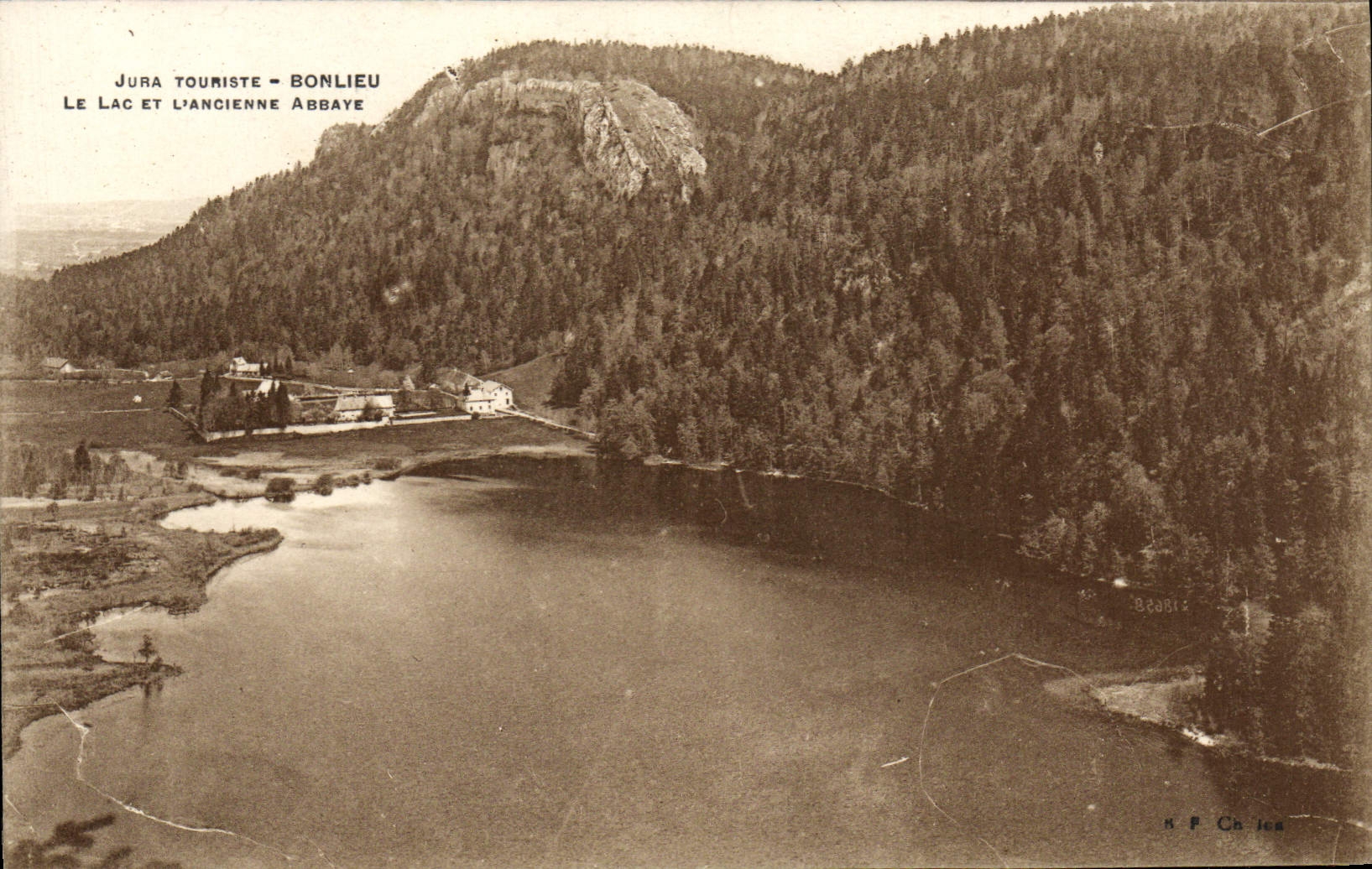 VINTAGE POSTCARD the Jura Bonlieu Tourist the Lake And the old abbey