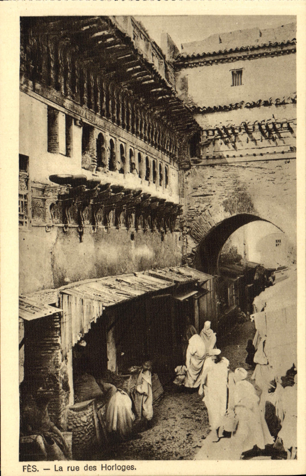 POSTAL Fes de la VENDIMIA la calle de los relojes