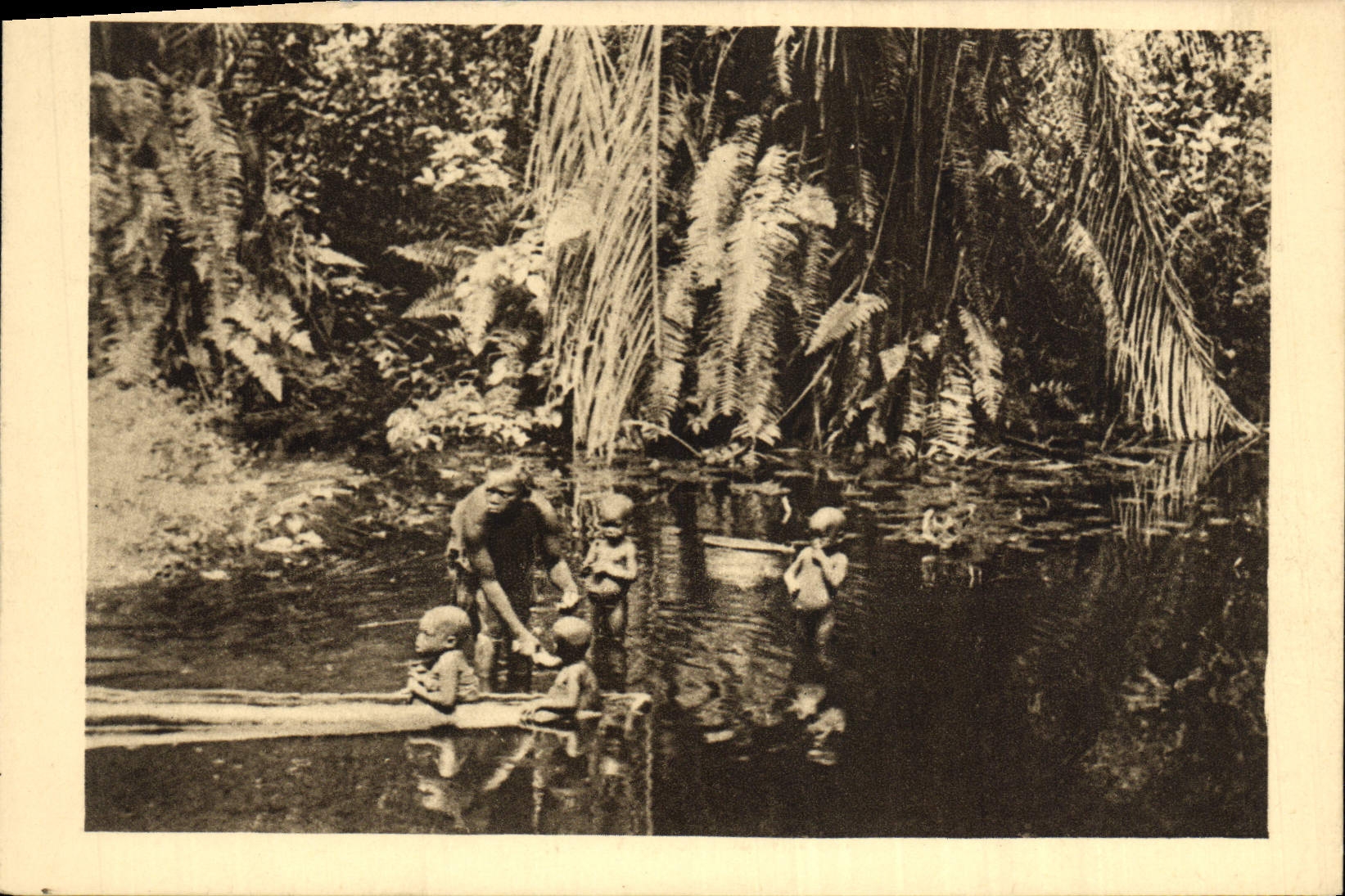 VINTAGE POSTCARD Gabon the bathe In an Equatorial Africa Backwater French Woman Children