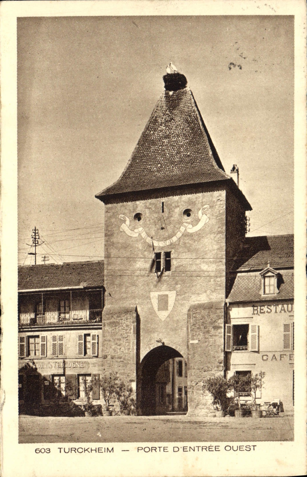 Cigüeña occidental de la puerta principal de Turckheim de la POSTAL de la VENDIMIA