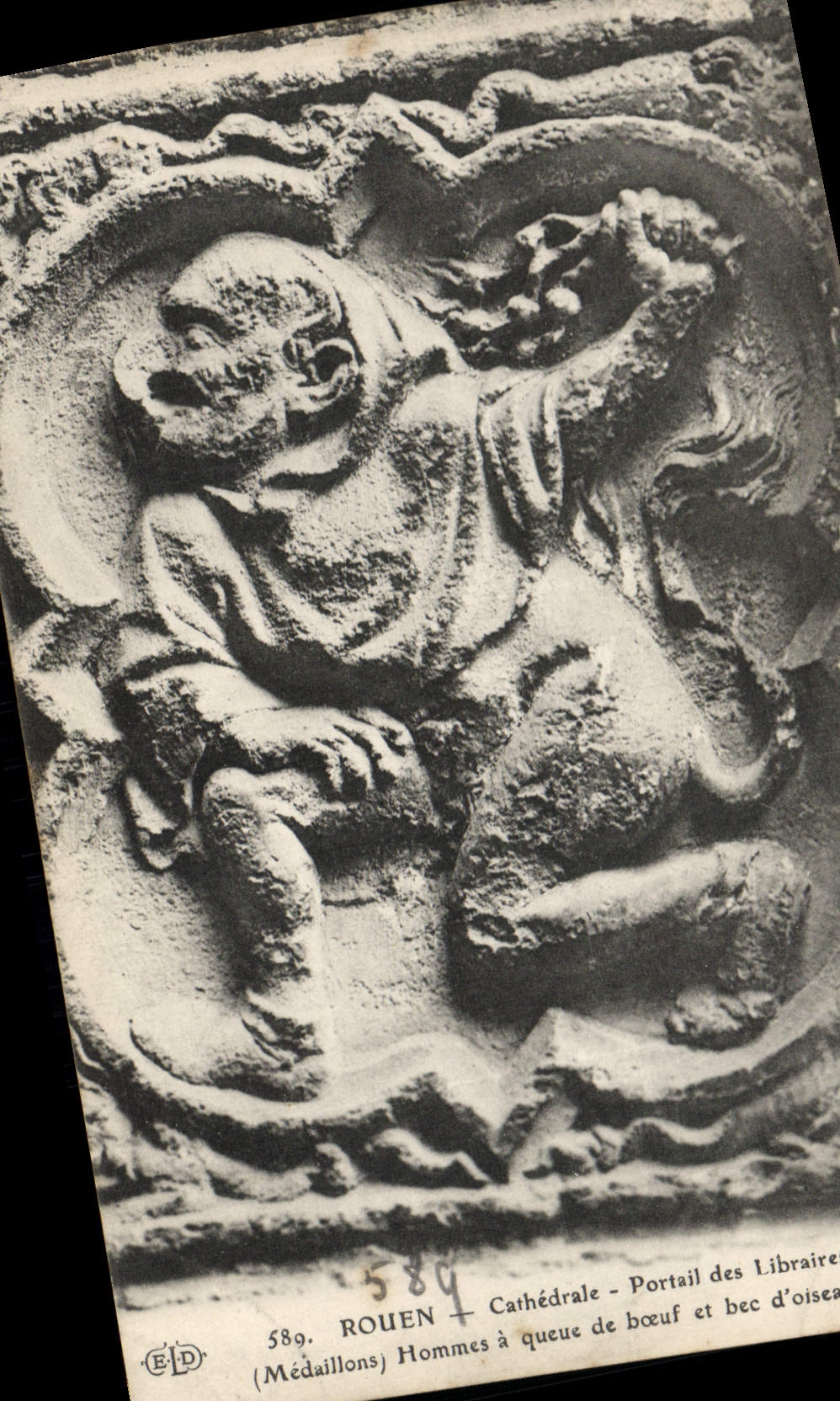 VINTAGE POSTCARD Rouen Cathedrale Gate of the Booksellers Medallions Men has ox tail and nozzle of birds