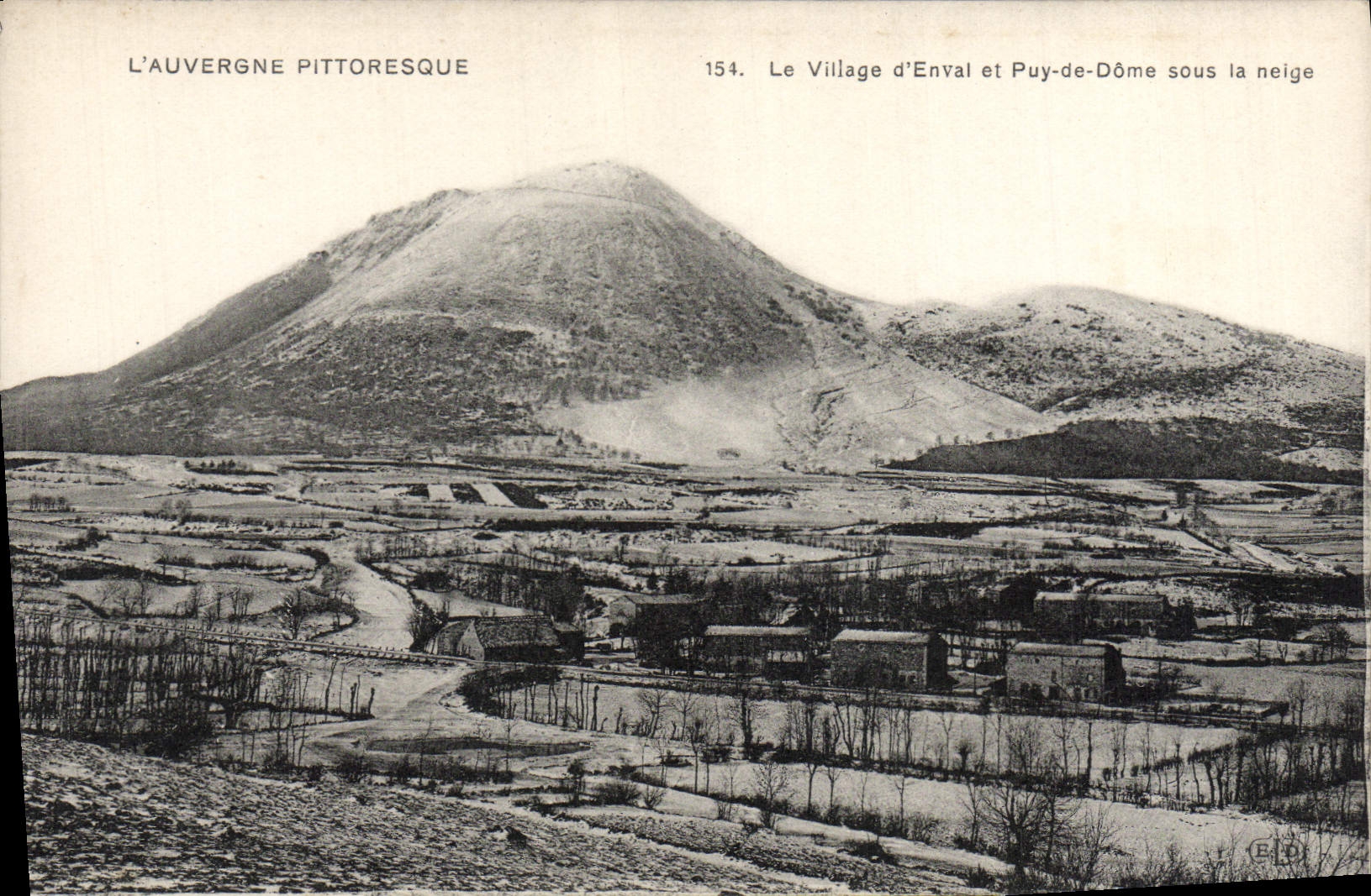 VINTAGE POSTCARD Picturesque Auvergne the Village of Enval and Puy de Dome under snow