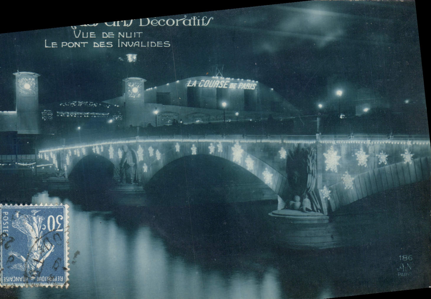CPA Paris pavillon des Arts decoratifs Vue de nuit Le pont des Invalides
