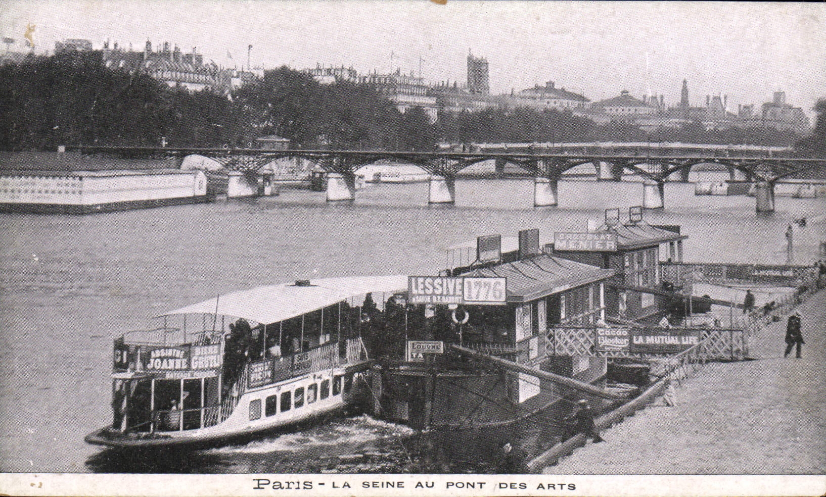 VINTAGE POSTCARD Paris the Seine with the Bridge of Arts Boat Barge
