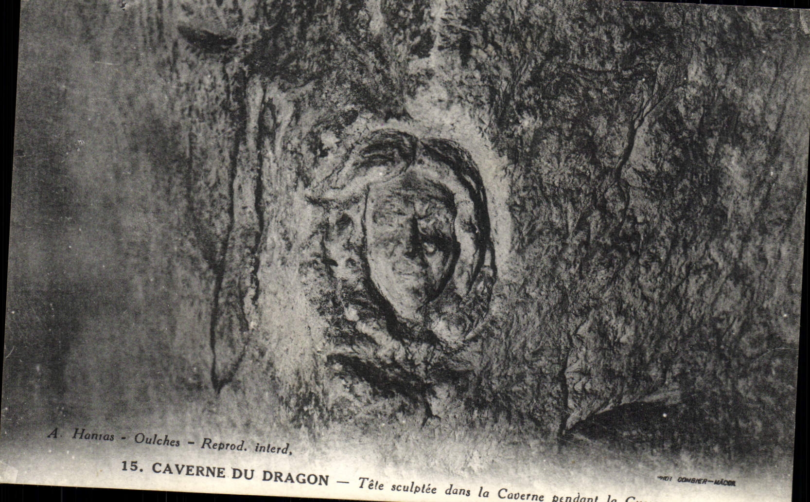 VINTAGE POSTCARD Cave Of the Dragon Sculptee Head in the cave during the war