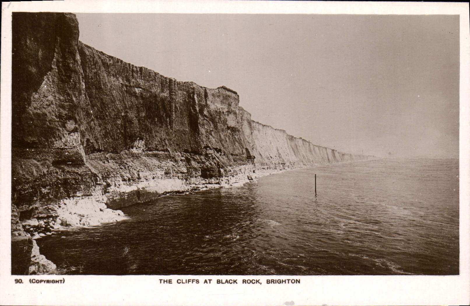VINTAGE POSTCARD The Cliffs At Black Brighton Rock'n'roll