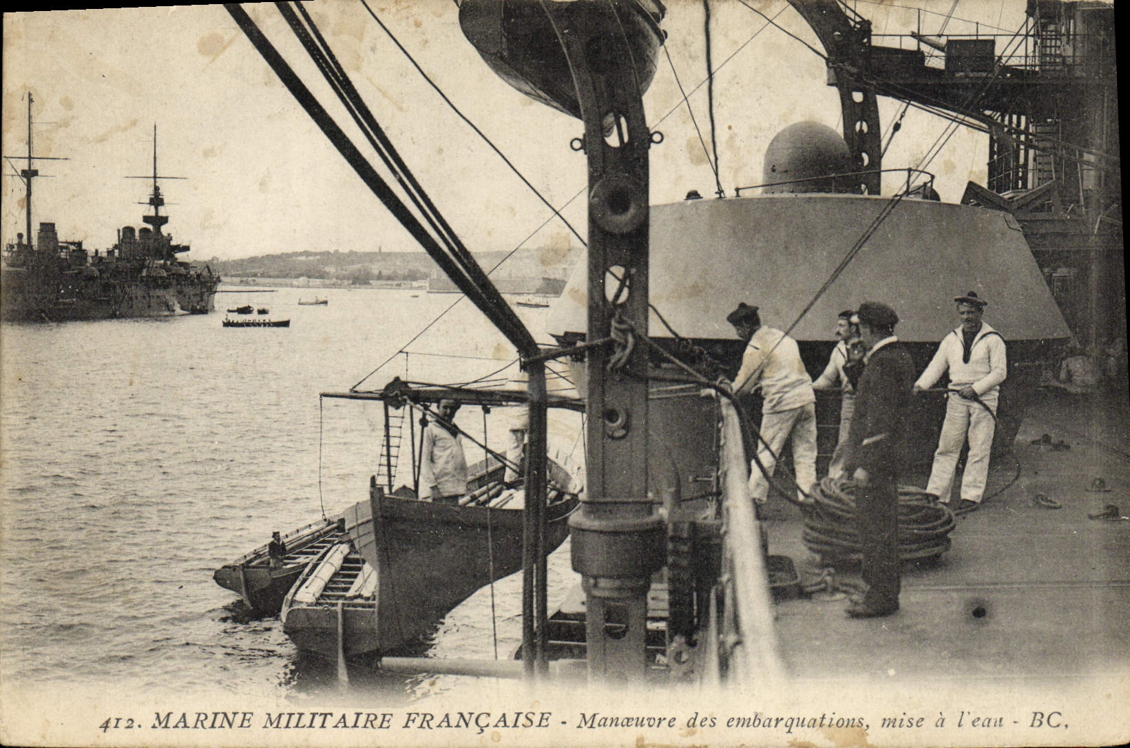 VINTAGE POSTCARD Warship Operates embarquations launched