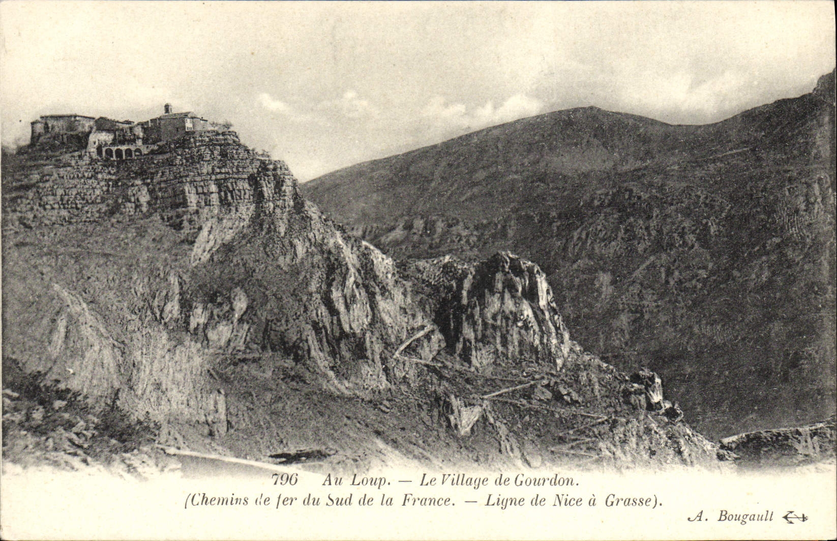 VINTAGE POSTCARD With the Wolf the Village De Gourdon Railroads of the south of France Line of Nice has Grasse