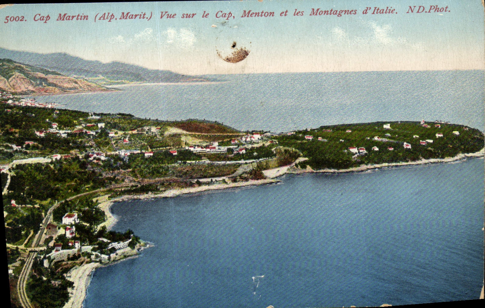 POSTAL Roquebrune de la VENDIMIA visto en el cabo Menton y las montañas de Italia