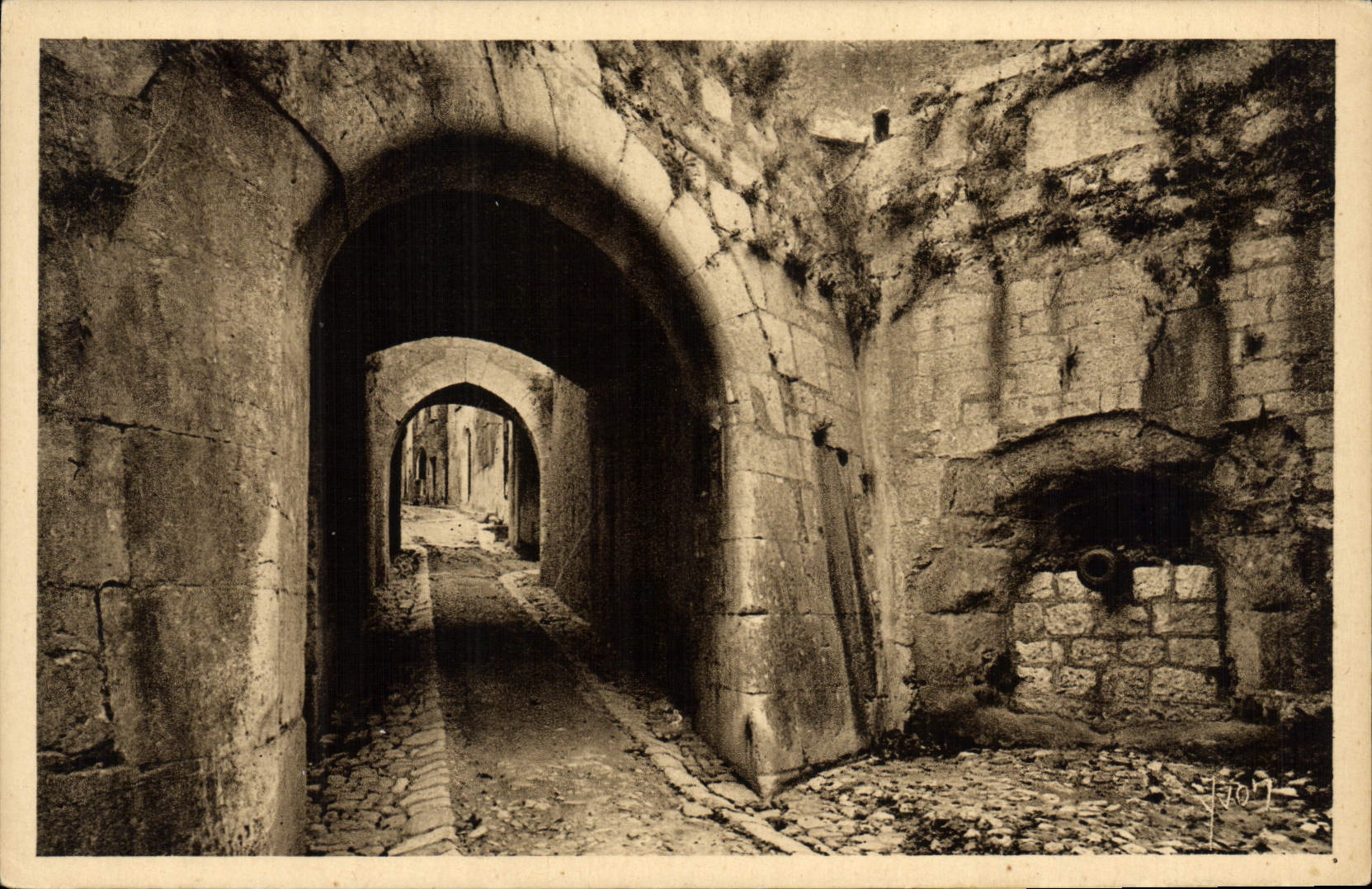 VINTAGE POSTCARD St Paul the Entry of the Village By the Old fortifications and the gun which defended it