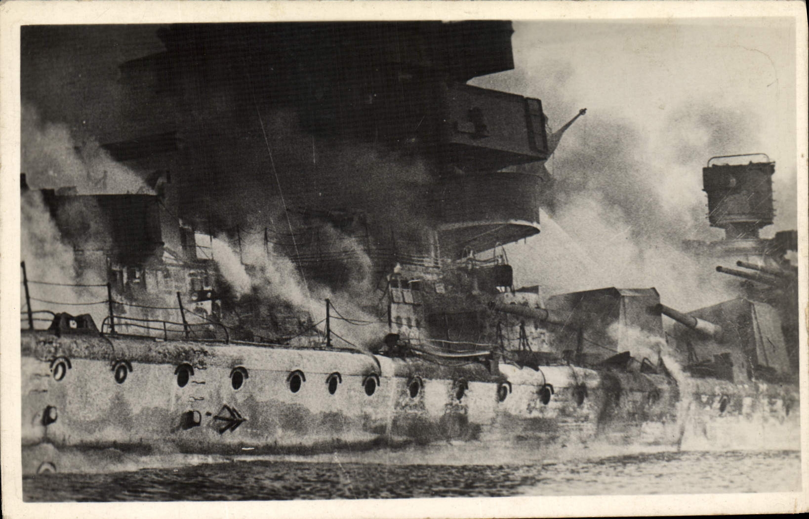Real photo Bateau War Sets fire to Graf Spech in roads