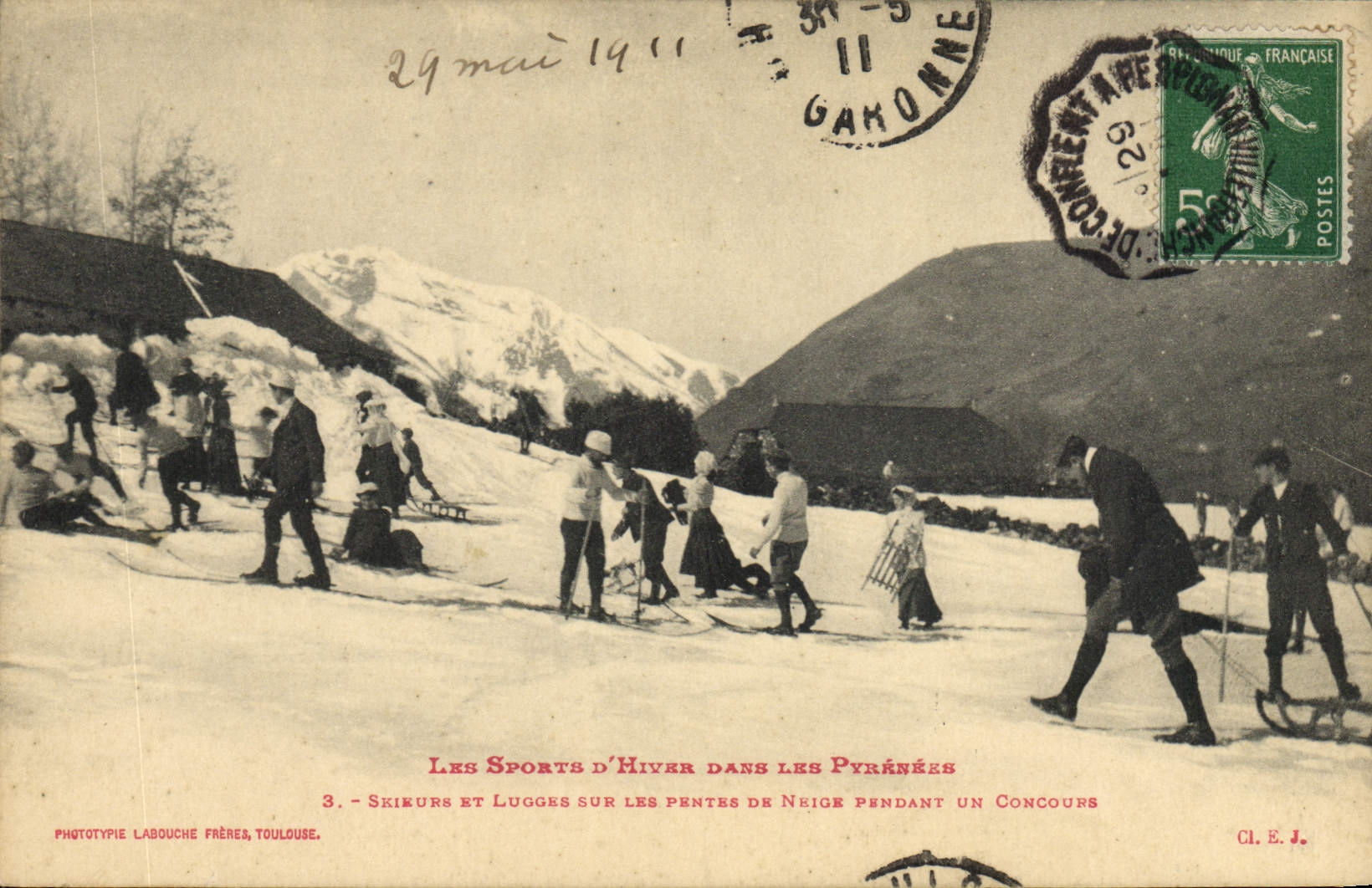 VINTAGE POSTCARD Winter sports Ski the Pyrenees Skiers and Lugges on the slopes of snow during a contest