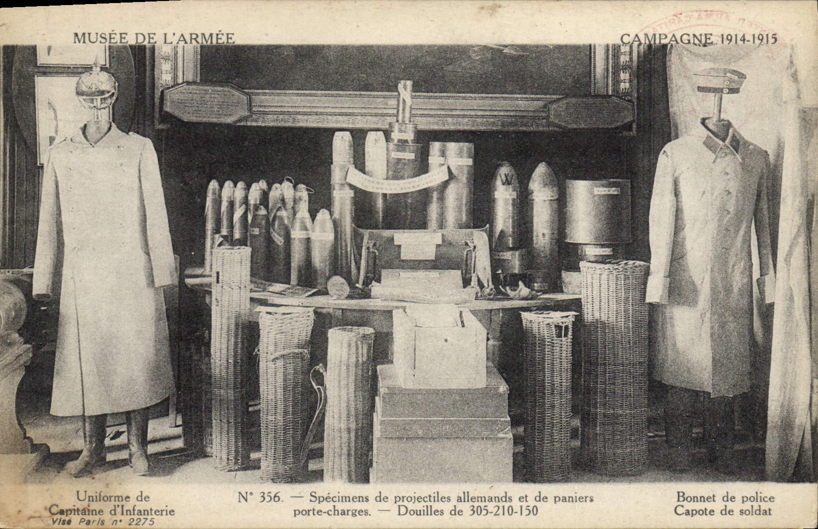 El museo de Militaria París de la POSTAL de la VENDIMIA de los especímenes del ejército de proyectiles y de cestas alemanes lleva cargas