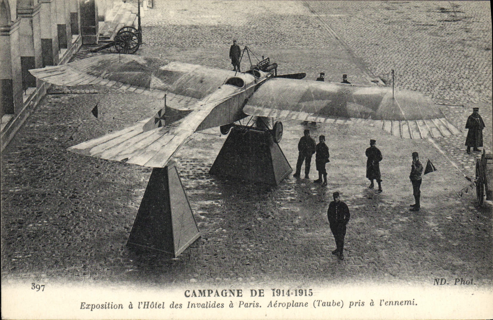 VINTAGE POSTCARD Militaria Exposition with the hotel of the invalids has Paris Airplane Taube taken with the enemy