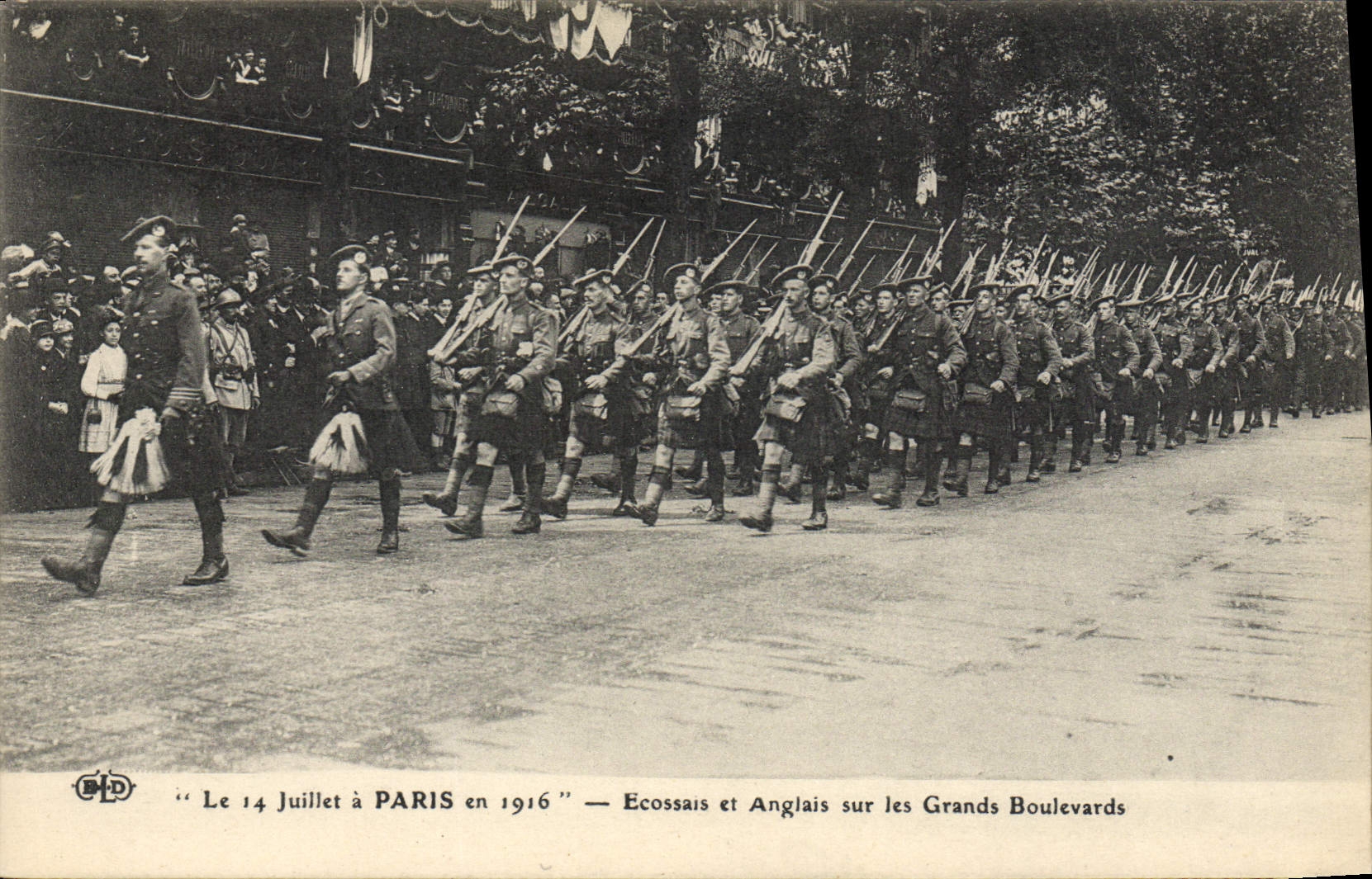 VINTAGE POSTCARD Militaria on July 14th has Paris in 1916 Scot and English on the grand boulevards